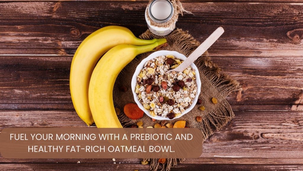 Bowl of oatmeal with sliced banana and chopped nuts.